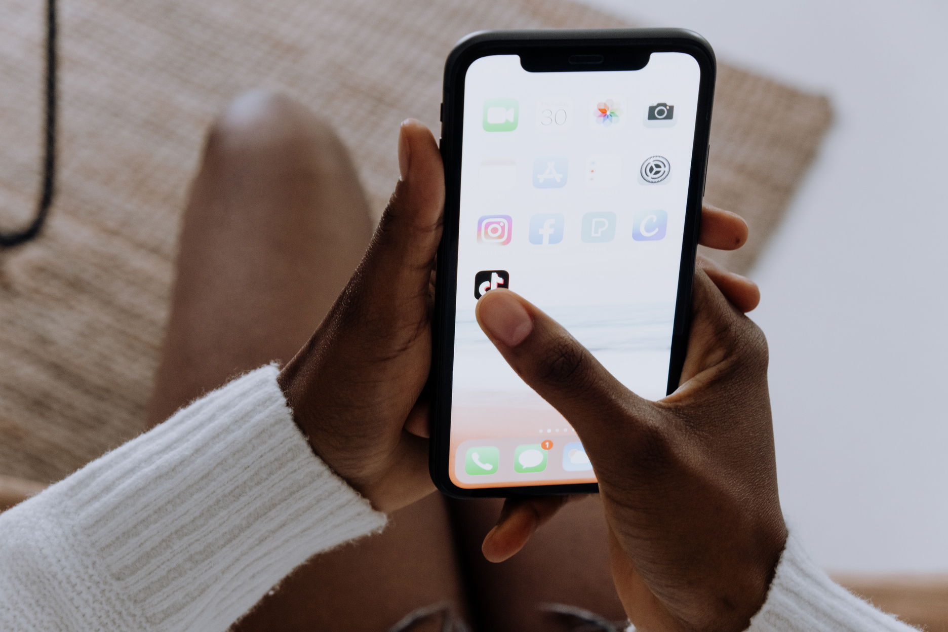 Person Holding Black Iphone 4